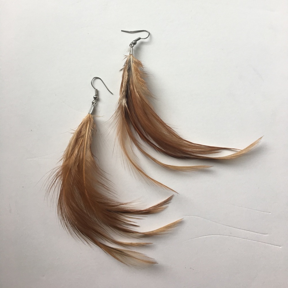 Rust colored feather earrings