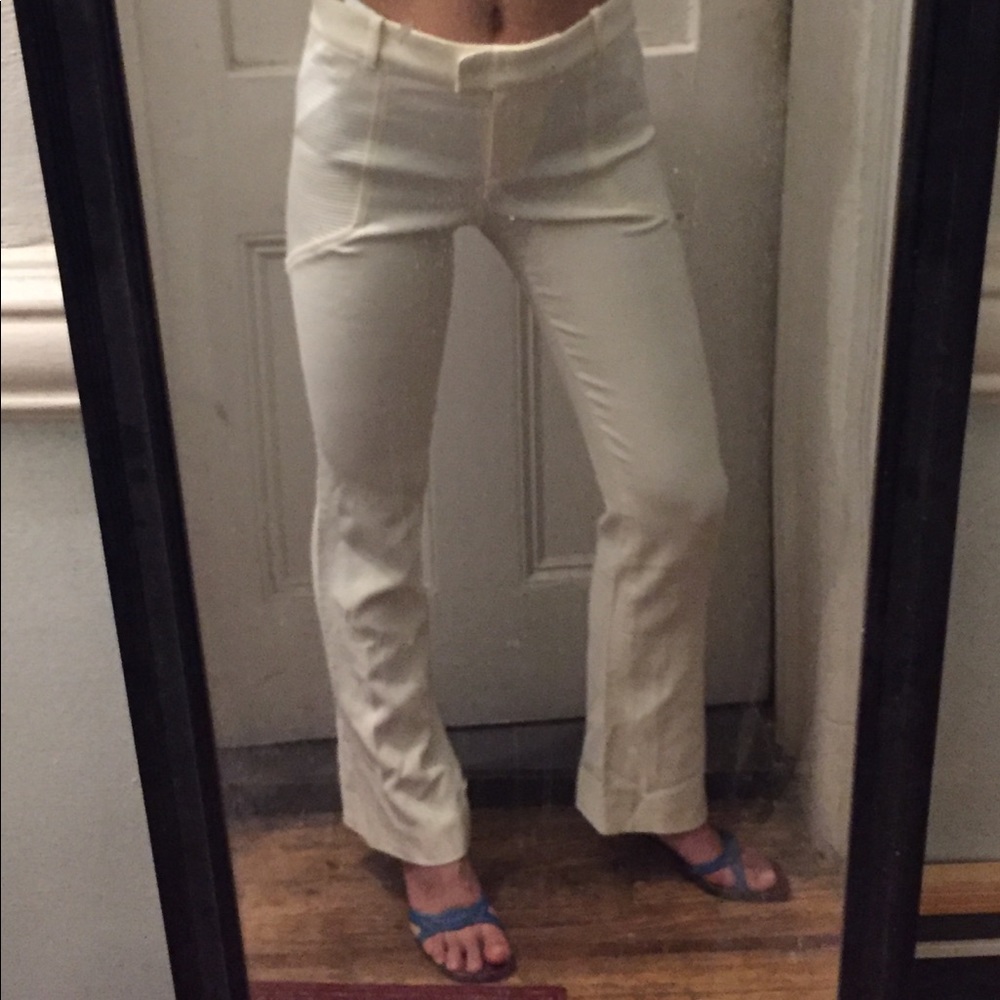 White form fitting Versace wool flared pants