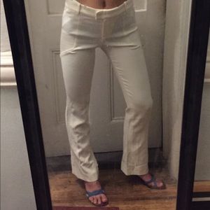 White form fitting Versace wool flared pants