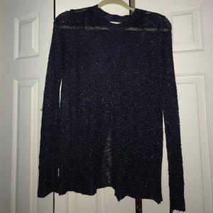 Jennifer Lopez open back sweater