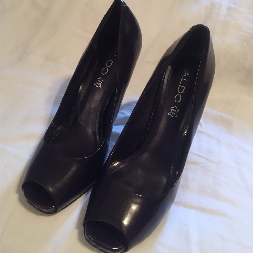 Purple peep toe pumps