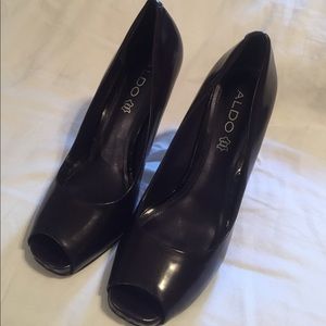 Purple peep toe pumps