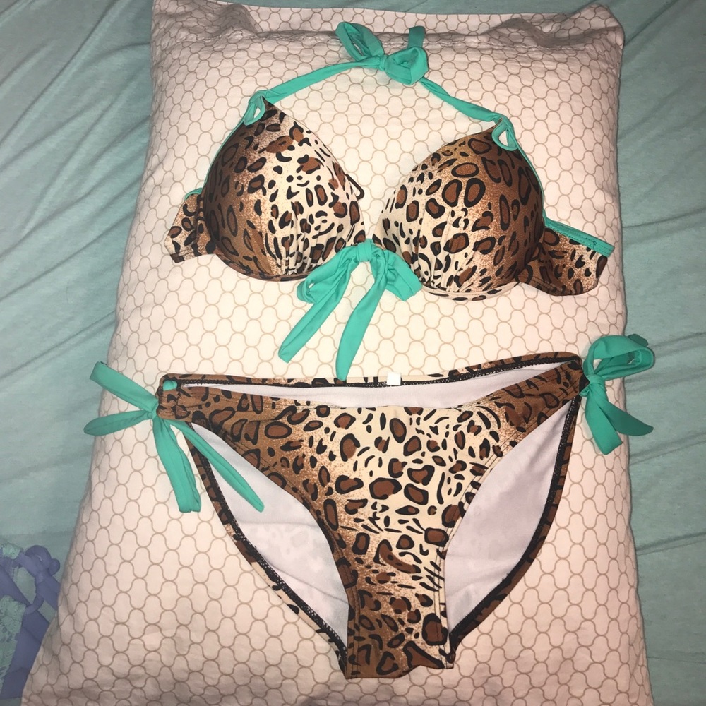 Gently used Medium Teal cheetah print bikini