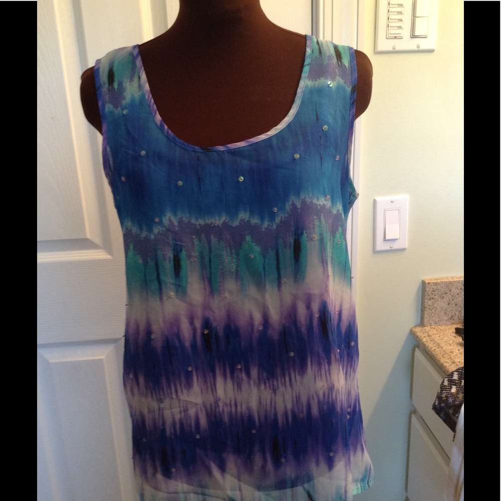 Sleeveless chiffon blue top with under layer