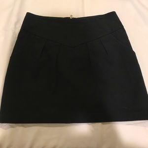 Black pocket mini skirt