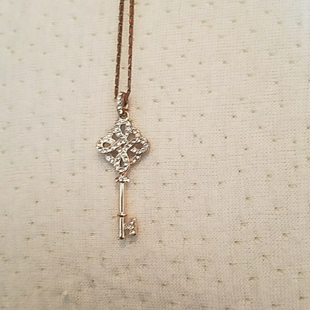 Vintage bronze jewled key and chain