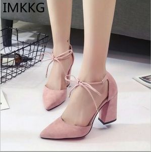Soft pink lace up pumps