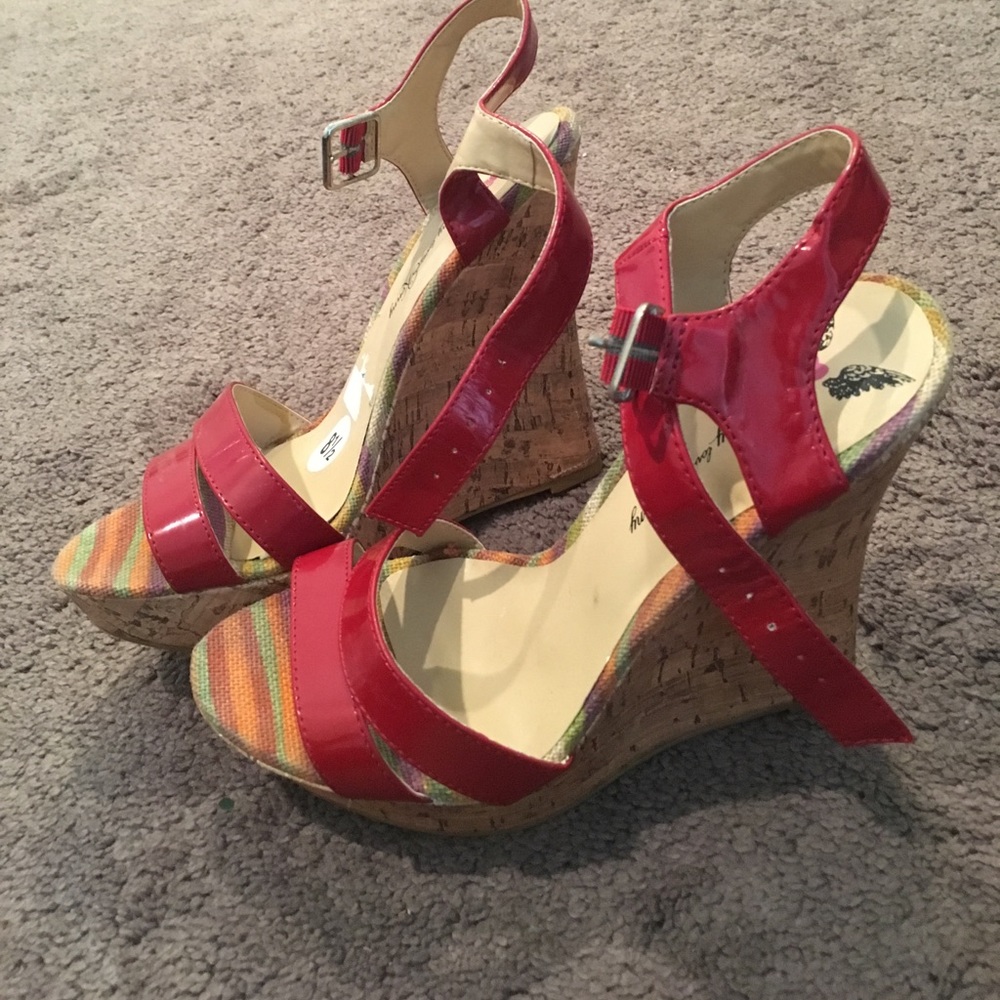 Red strappy wooden wedges