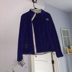 purple fuzzy North Face jacket