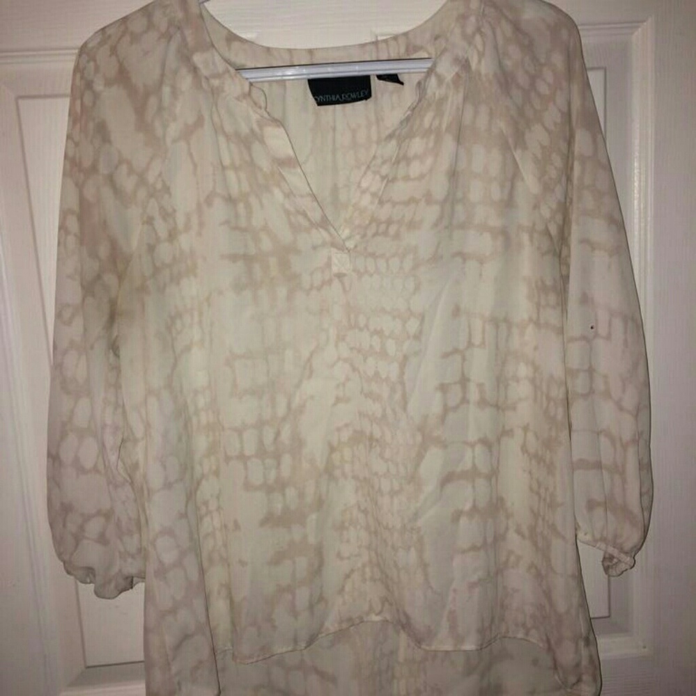 A loose long sleeved blouse