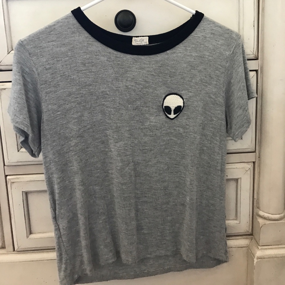 A grey short sleeve top.