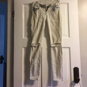 Off white ripped knee jeans