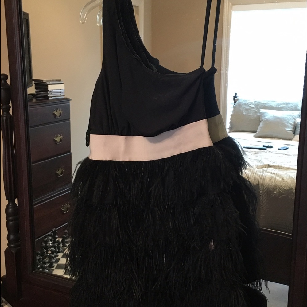 One-shoulder black dress w/ feather shirt