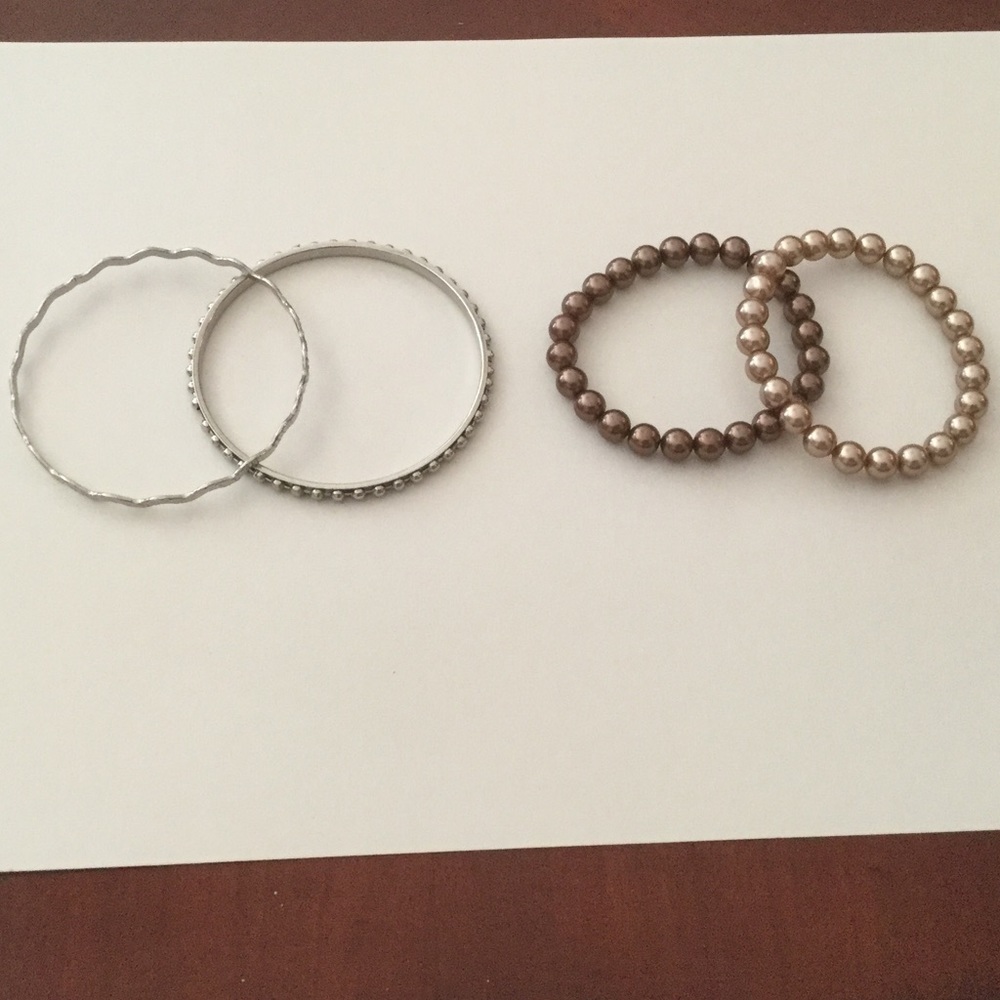 Two pairs of matching bracelets