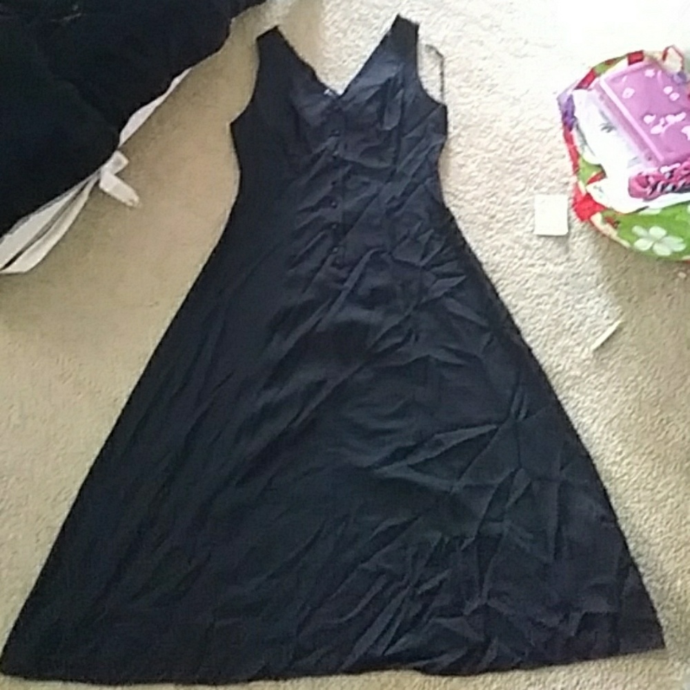 Shin length black dress