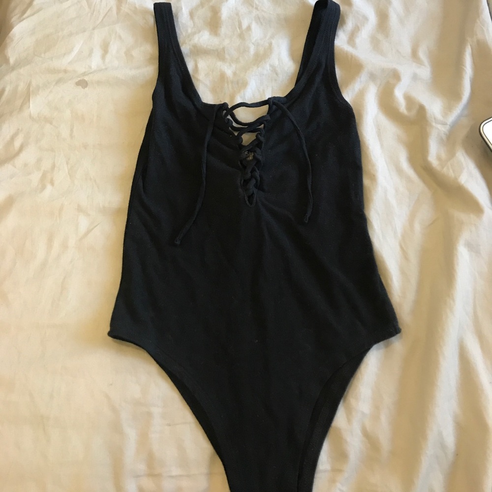 Cross cross detailed body suit