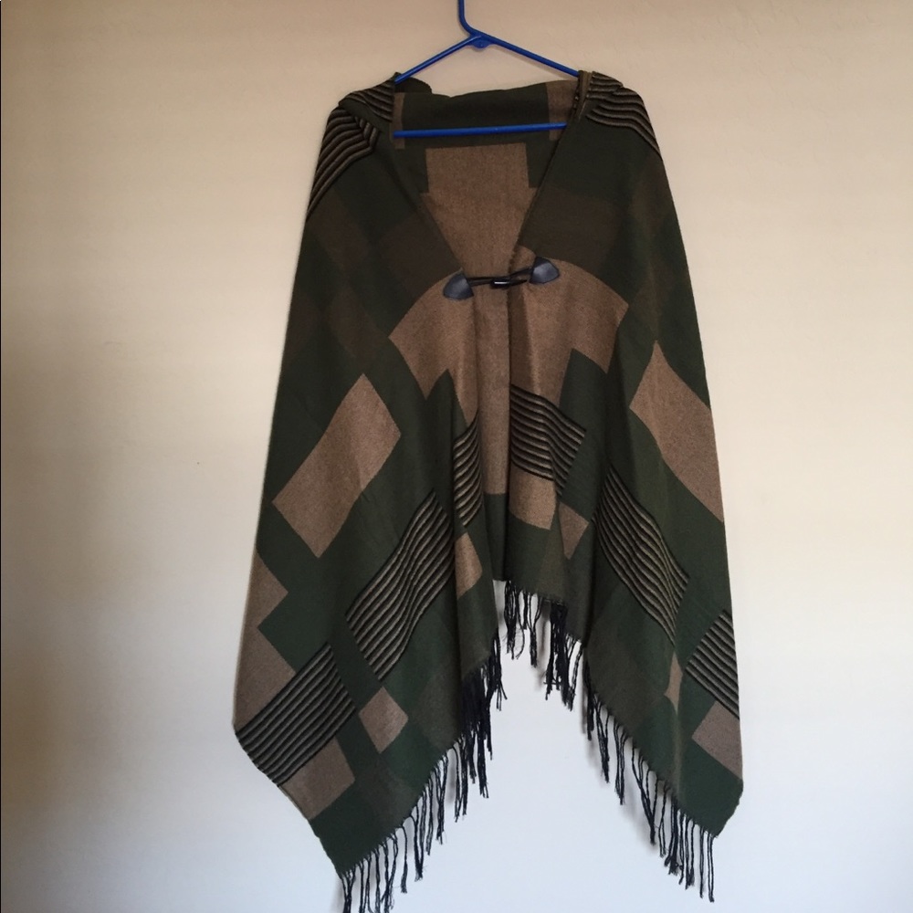 Hooded poncho with hook in front