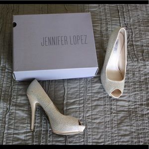 JLo peep toe platforms.... never worn!