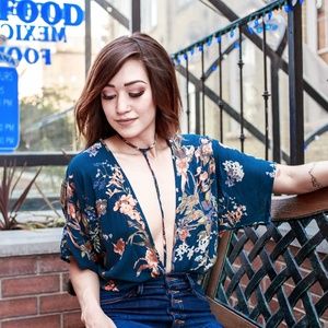 Navy blue floral body suit.