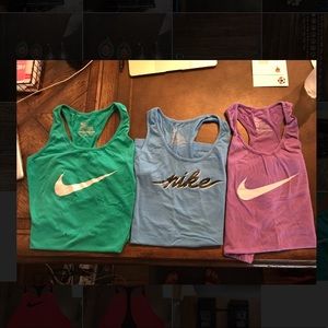 Group of Nike Tank tops