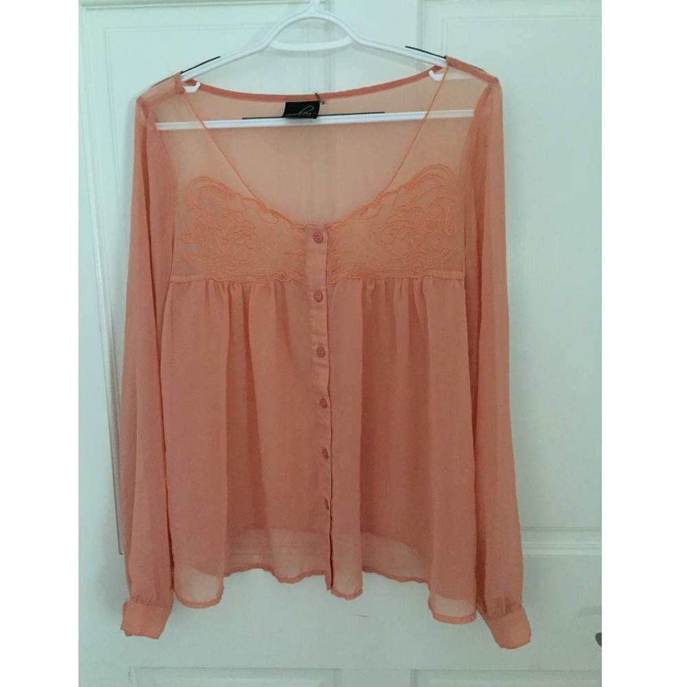 Salmon colored long sleeve blouse 100% polyester