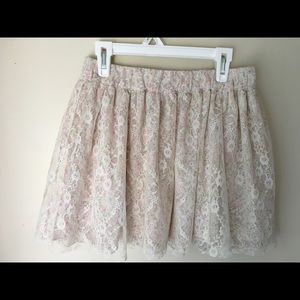 Multi layer skirt. Lace/floral