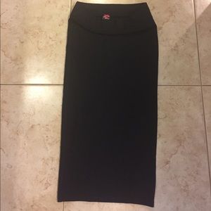 BEBE MIDI SKIRT. BLACK. Size S