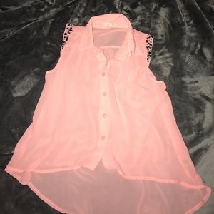A salmon tank top