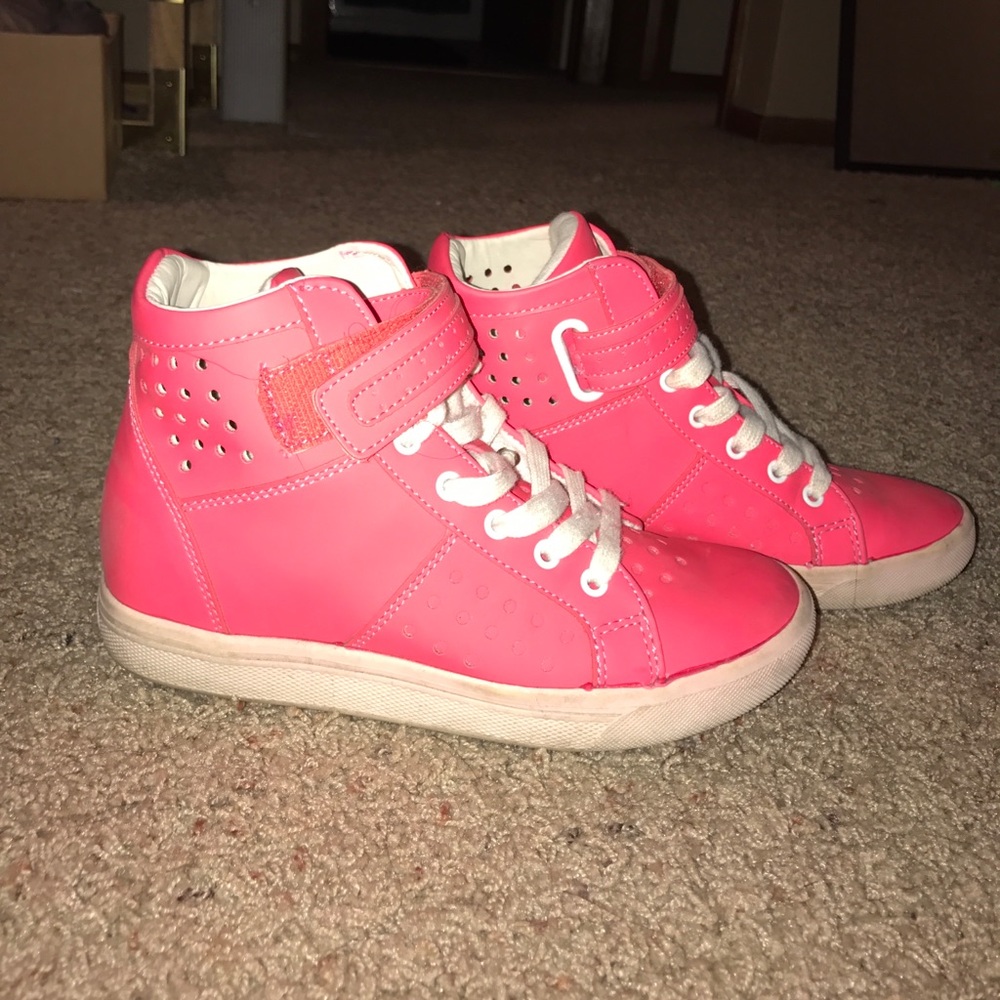 Aldo heeled sneakers.