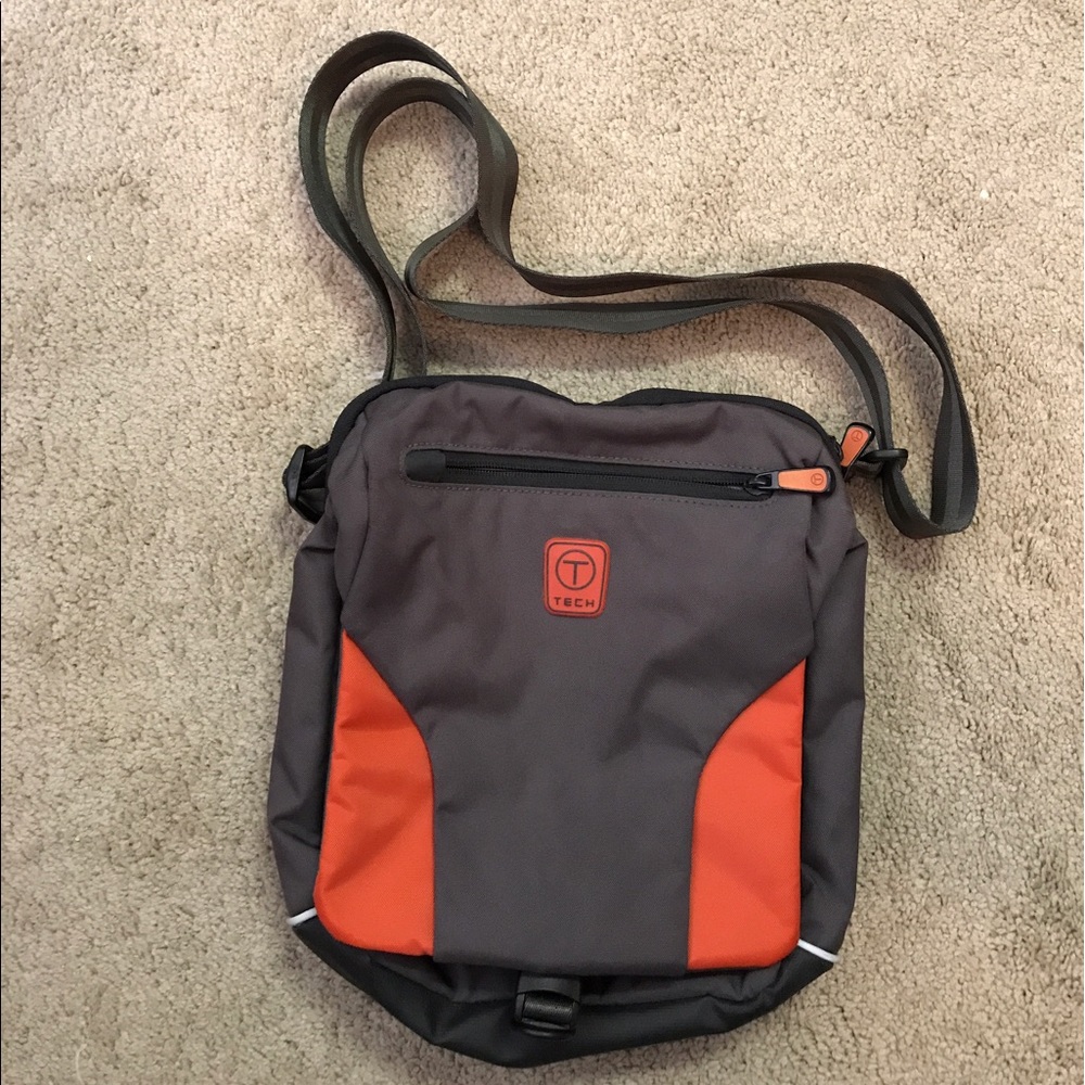 Small Tumi messenger bag.  Used once.  Like new.