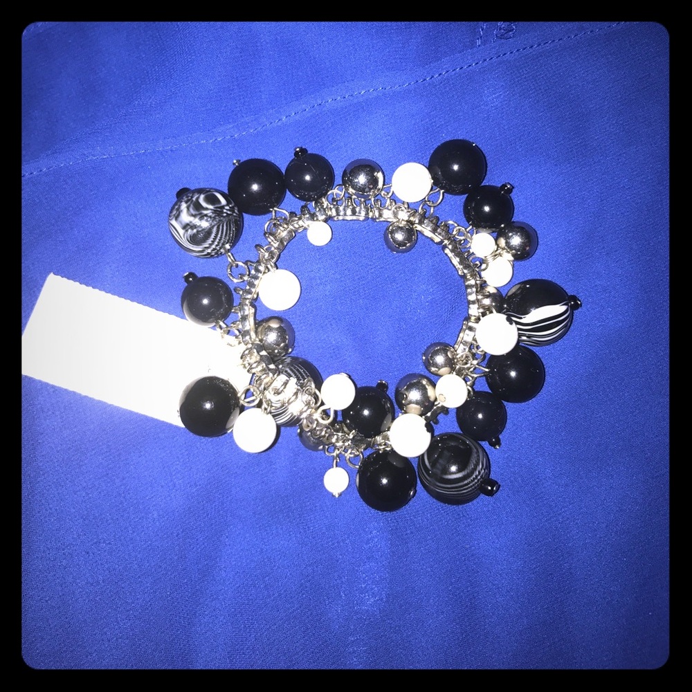 ⭐️ NWT black white and silver charm bracelet