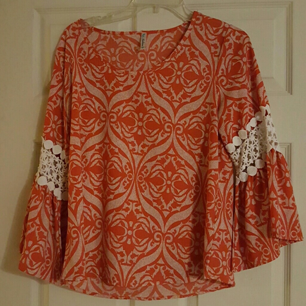 Auditions orange and white blouse