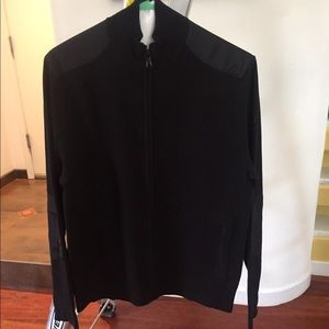 Black sweater with leather shoulders and elbows