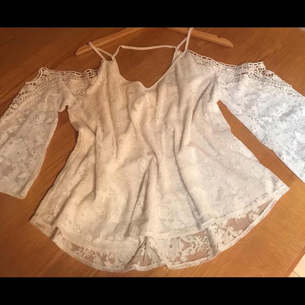 Open shoulder laced bell sleeve top