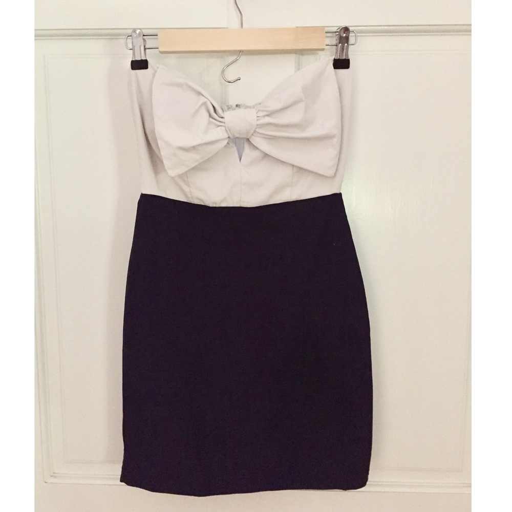 Navy blue and white strapless dress with bow