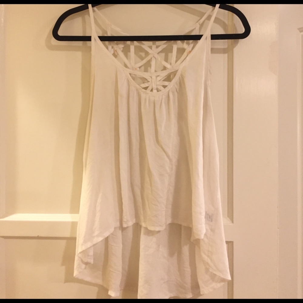 Whit LF tank top with crocheted flowers on back.