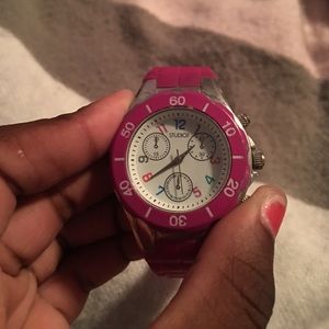 A pink analog watch