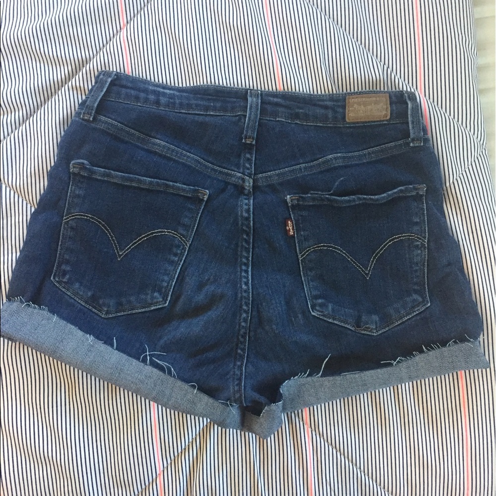 dark wash high waisted levi's cut-offs shorts