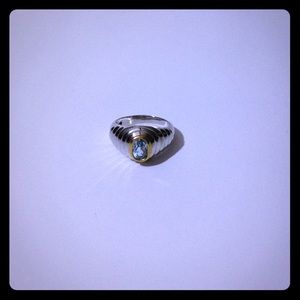 Sterling silver ring with 14k bezel blue topaz