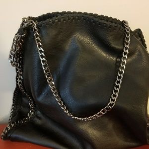 Steve Madden black bag with handles.
