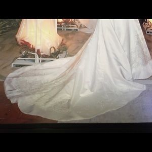 Wedding dress with little bride dress.