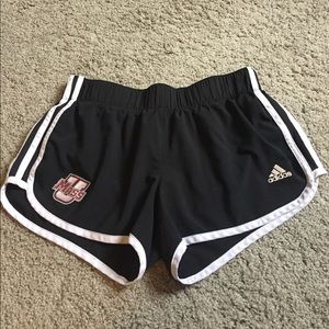 Adidas workout shorts with UMass logo