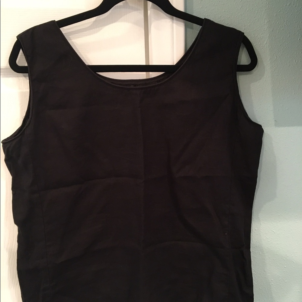 100% Linen, washable. One black and one navy blue