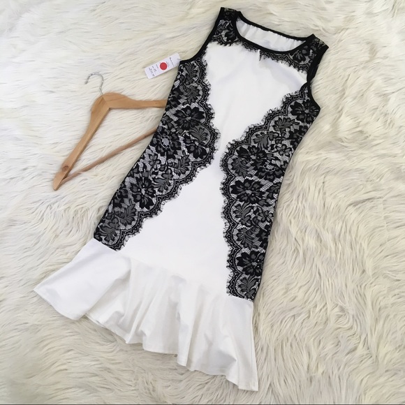 Doneli Fashion Dresses & Skirts - 🎉SOLD🎉Doneli Fashion B&W Peplum Mini Lace Dress
