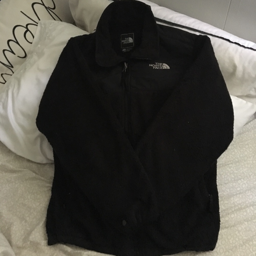North face girl large black fleece zip up jacket.