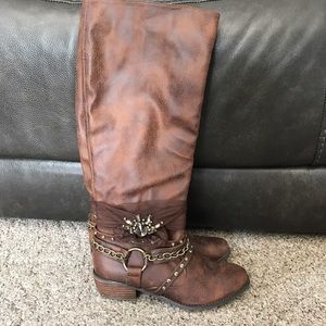 Brown tall boots with adorable detail
