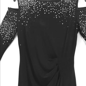 Trendy, Black long sleeve dress. Open shoulder.