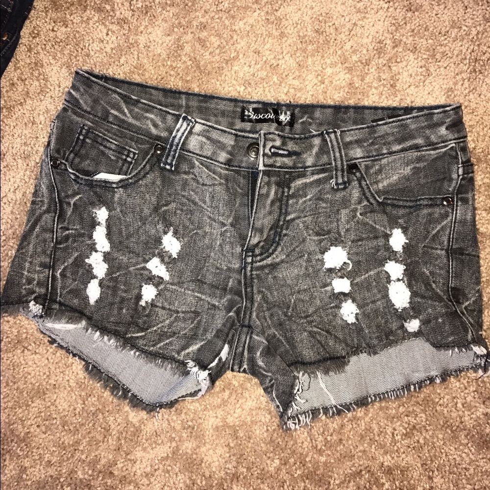 Black distressed shorts