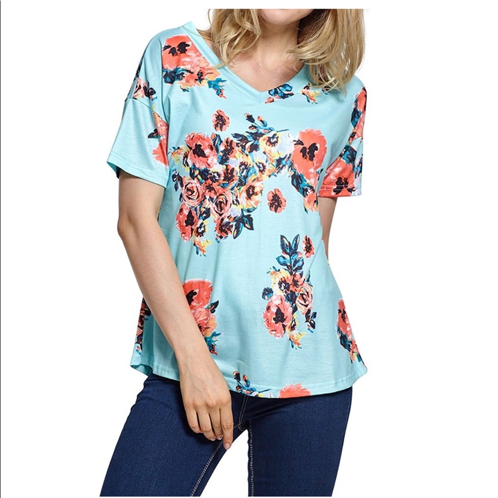 Floral tee! Longer in back