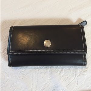 Coach trifold wallet with checkbook.